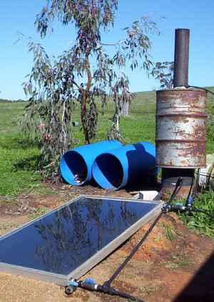Solar and wood water heater